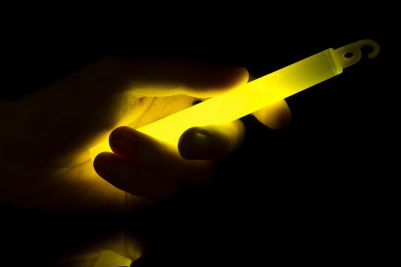 Hand holding a glow stick