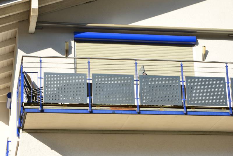 Modern Metal Balcony with high grade Privacy Protection Screen and metal Hand Rail at a residential Building