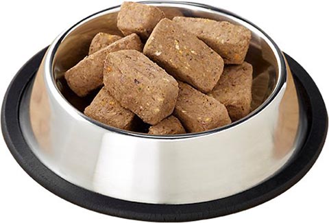 Primal Chicken Formula Nuggets Grain-Free Raw Freeze-Dried Dog Food in a bowl