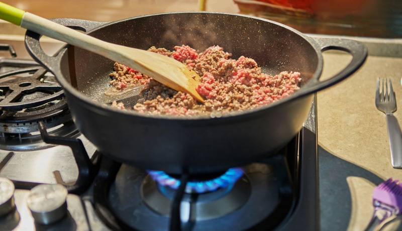 cooking ground beef in a pan