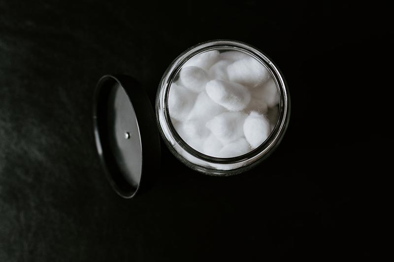 cotton balls in a container
