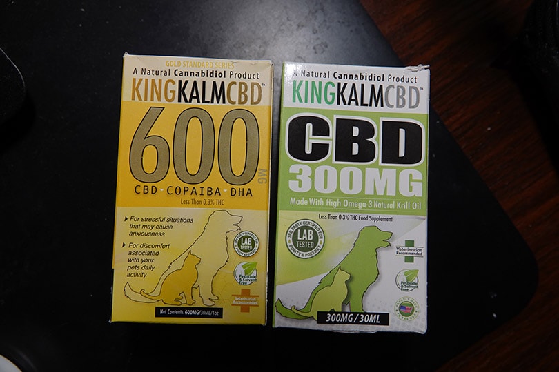 king kanine CBD oil extract products on a black table