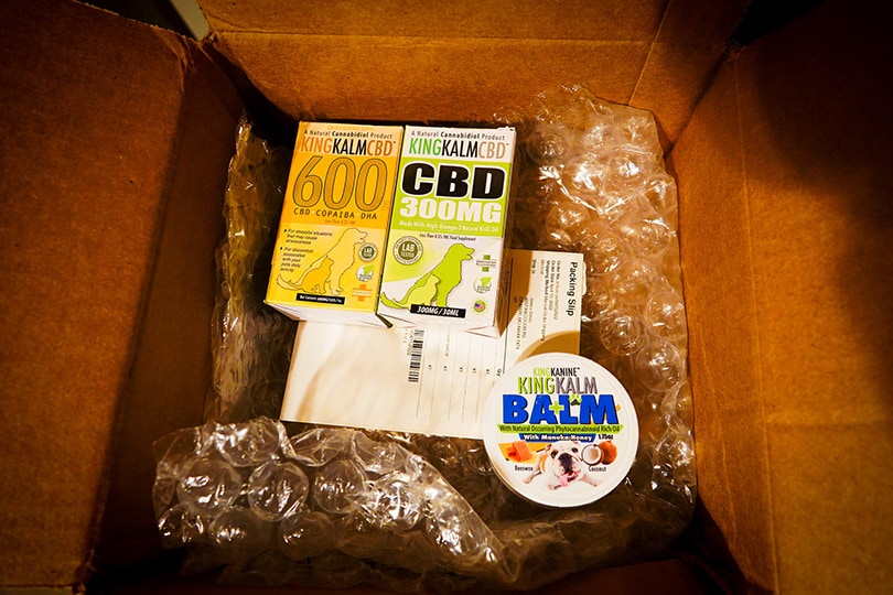 king kanine balm and cbd oil extracts in a box