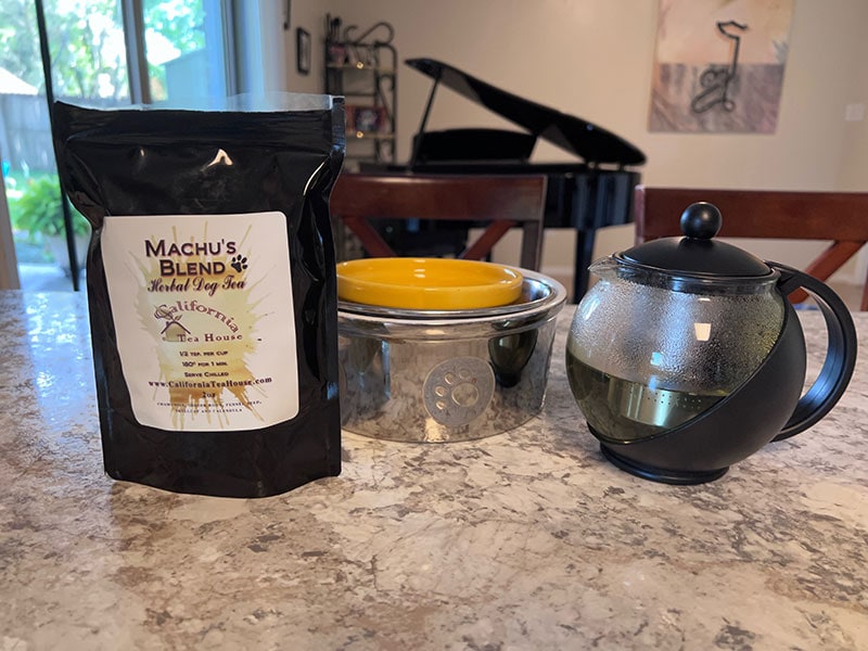 machu's herbal tea, kettle, and feeding bowl