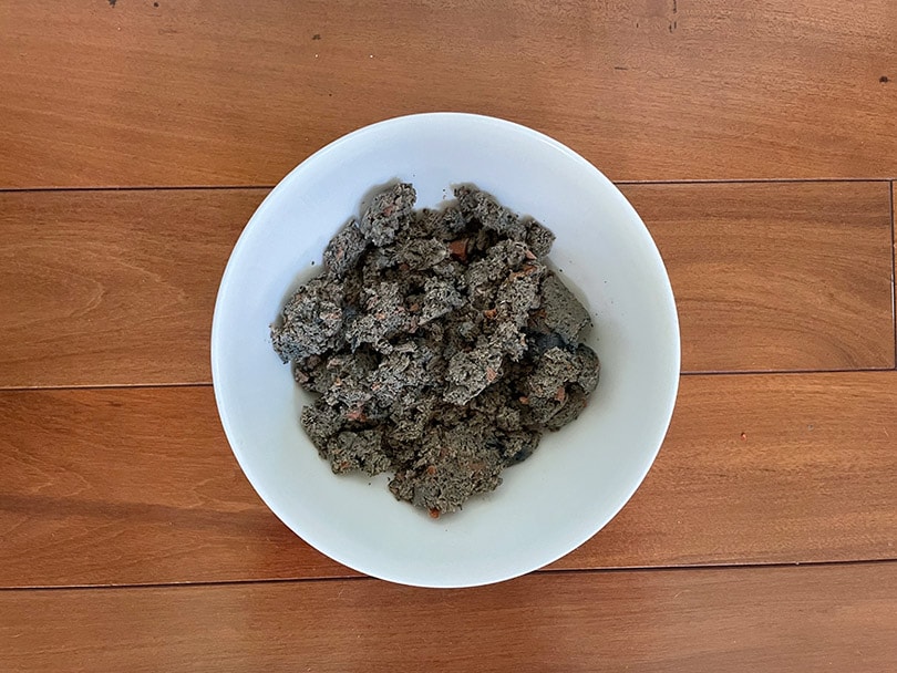 raised right dog food in a white bowl