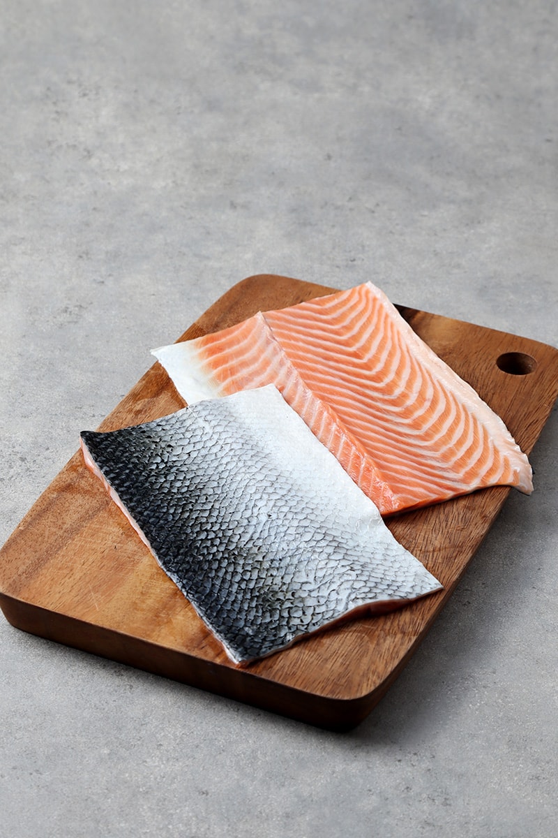 salmon skins on the chopping board