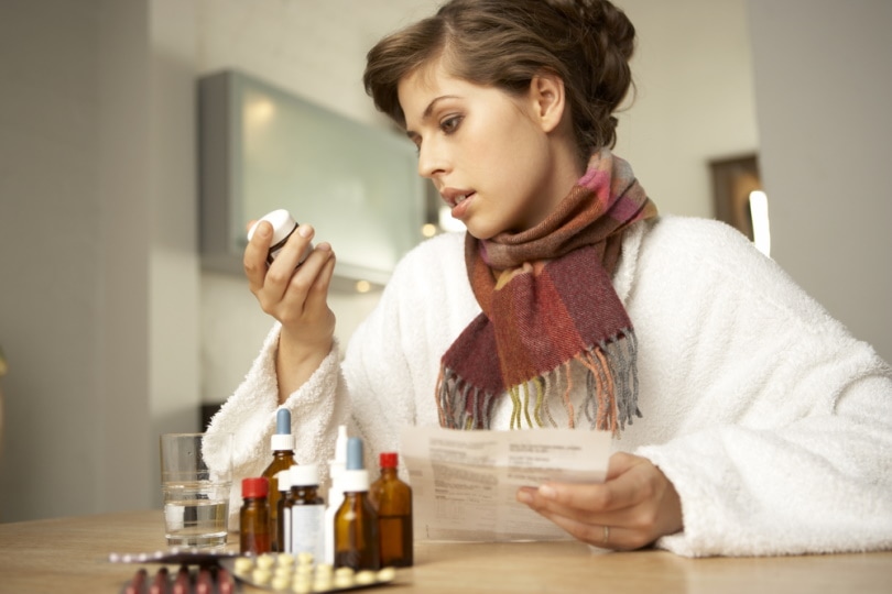 woman checking medicines