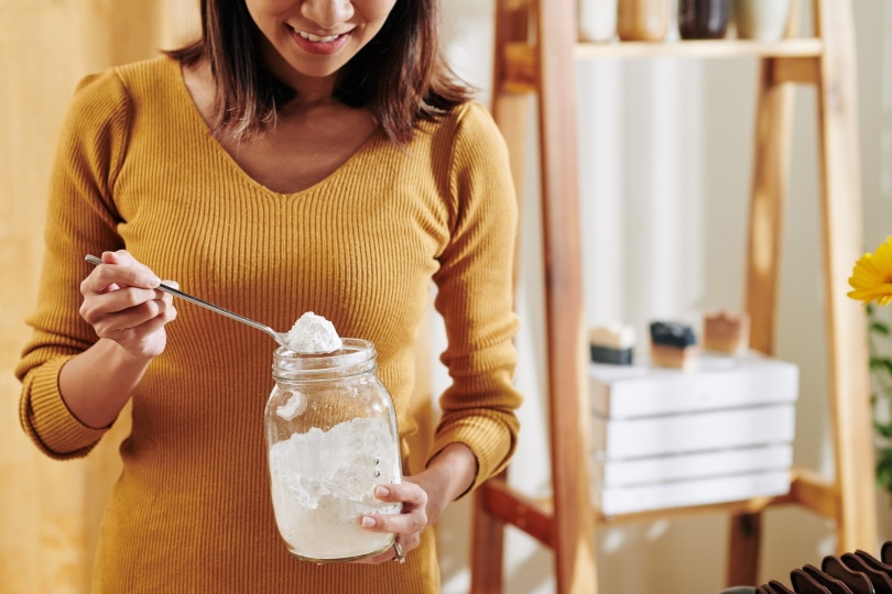 woman holding baking soda