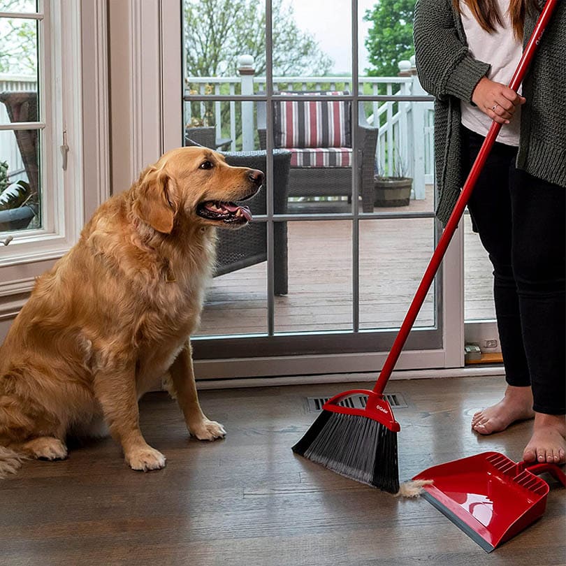 woman sweeping floor using O-Cedar Pet Pro Broom & Step-On Dustpan PowerCorner