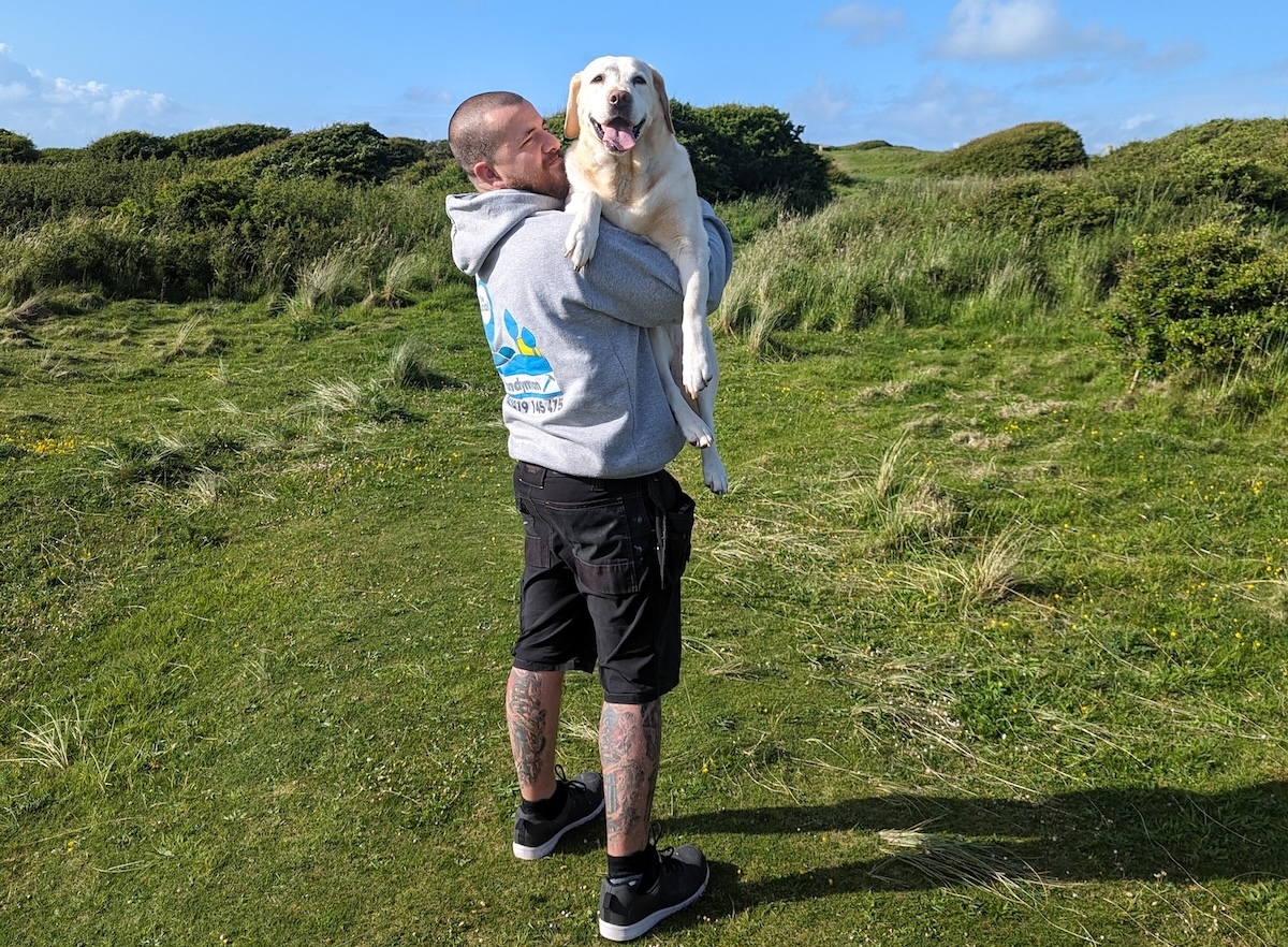 Bailey loves a walk, but who doesn't like being carried?
