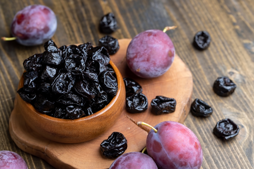 Black pile of prunes
